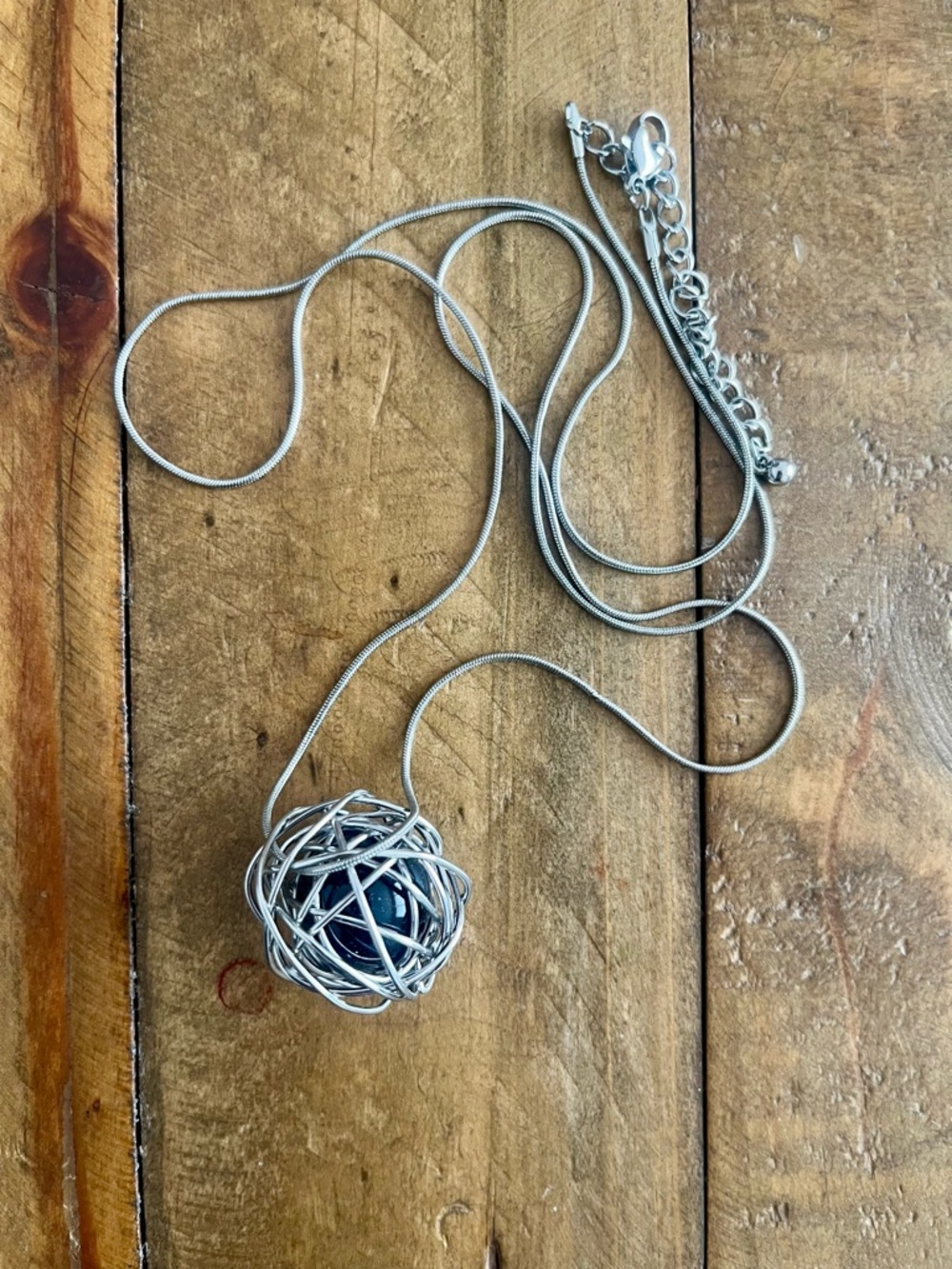 Silver-Tone Wire Cage Pendant Necklace with Blue Stone